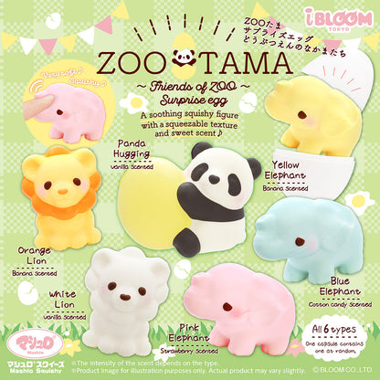 Options for Ibloom’s Zootama surprise egg squishies. You can get a Lion in White or Orange, Elephant in Pink, Yellow or Blue, or a Panda. They are set against a green background.